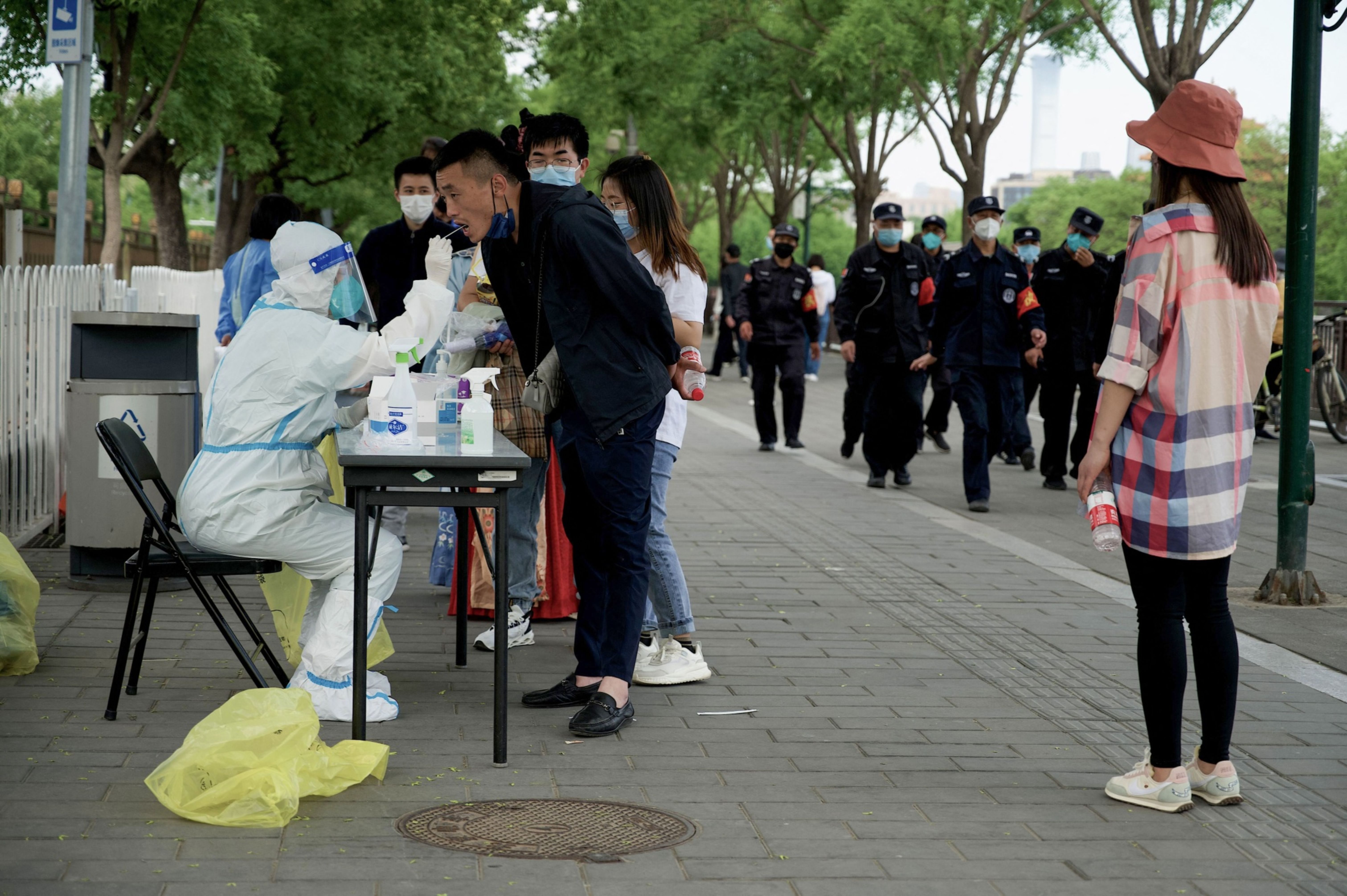 Videos of people being dragged into isolation censored in China