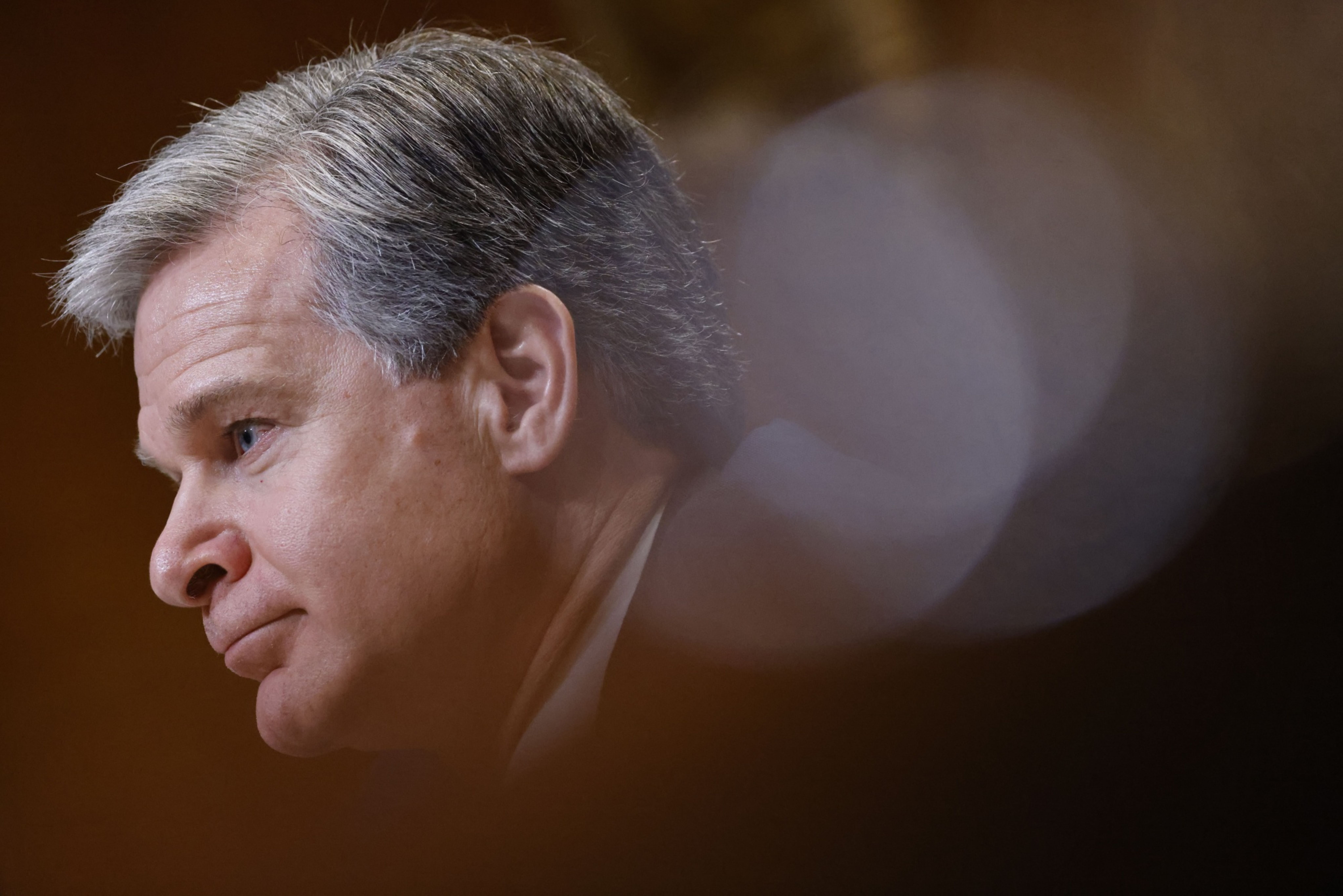 China is trying to ‘ransack’ Western companies, FBI head warns