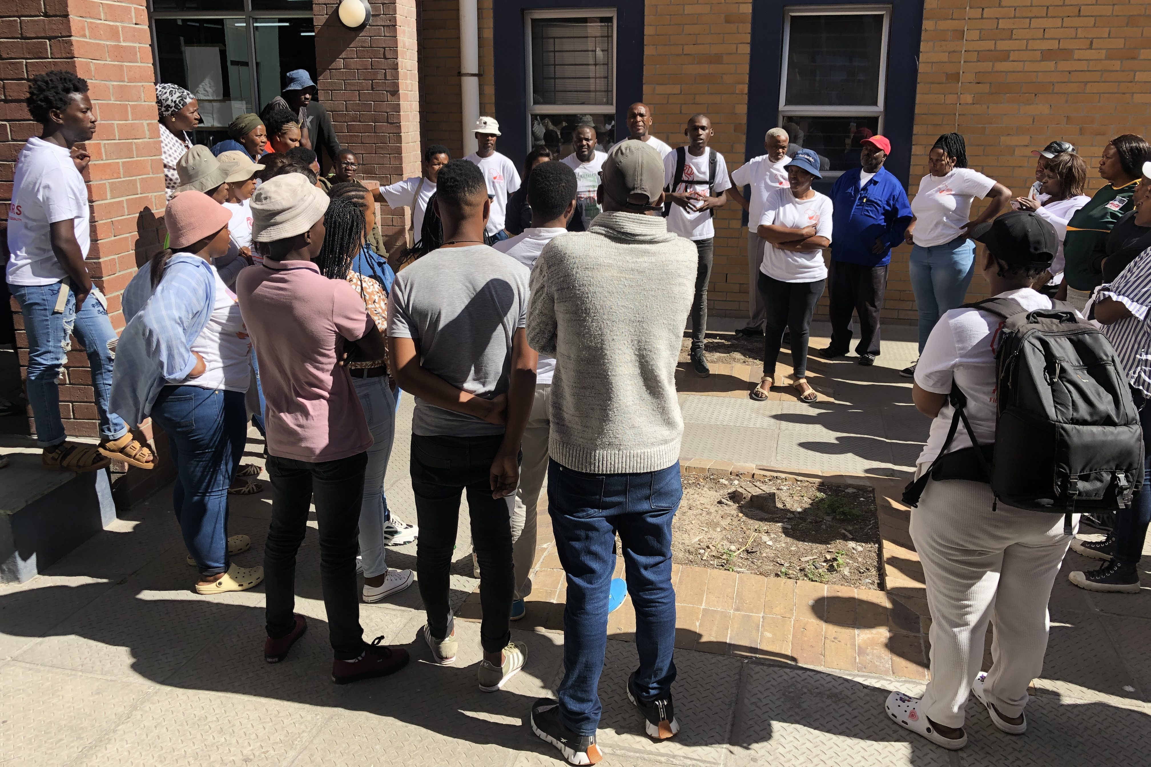 ‘Bring back the money’ — picketers vent anger at suspended SJC activist outside Khayelitsha court