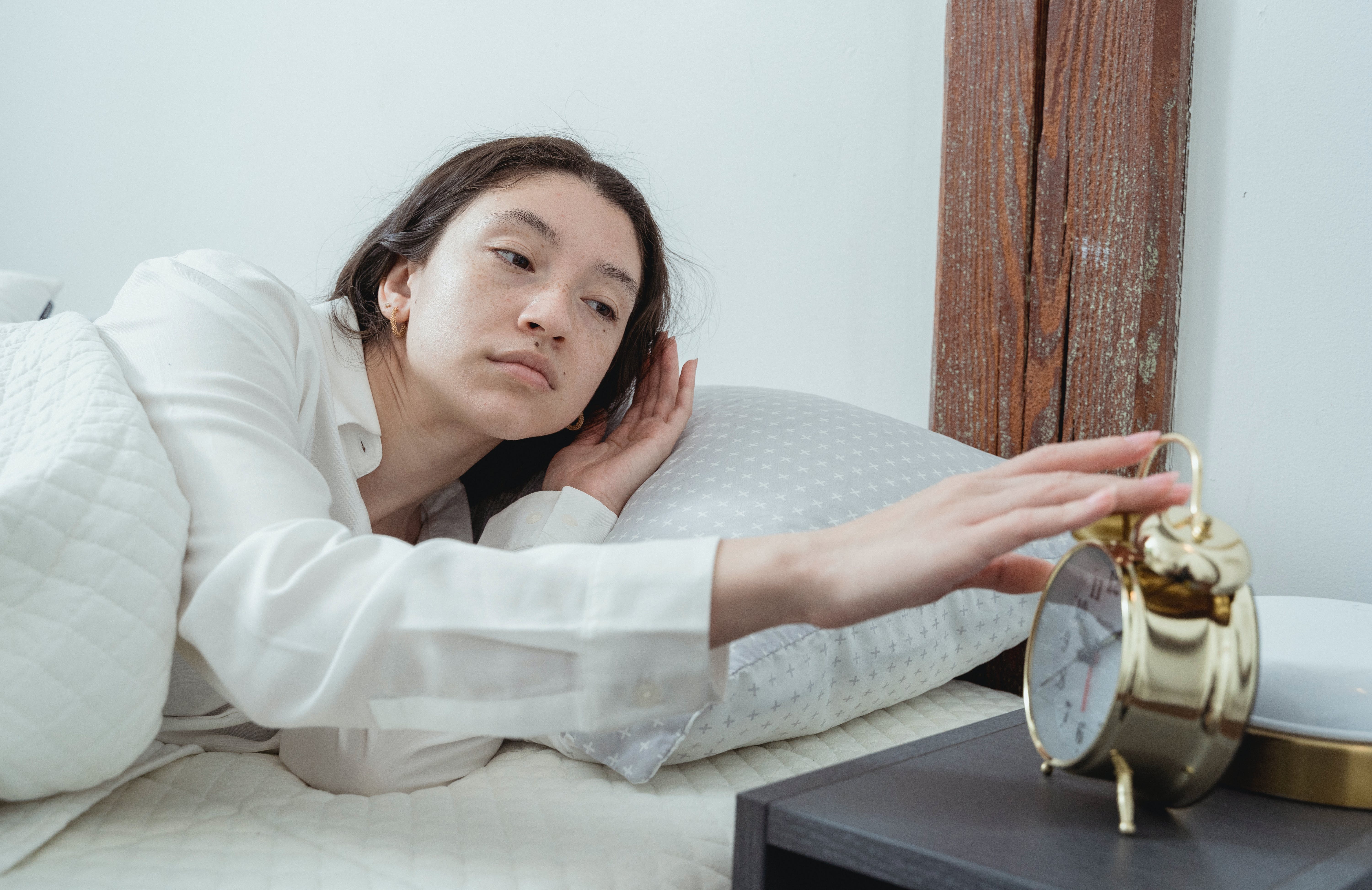 Hitting snooze on your alarm might not actually make you more tired in the morning – new research