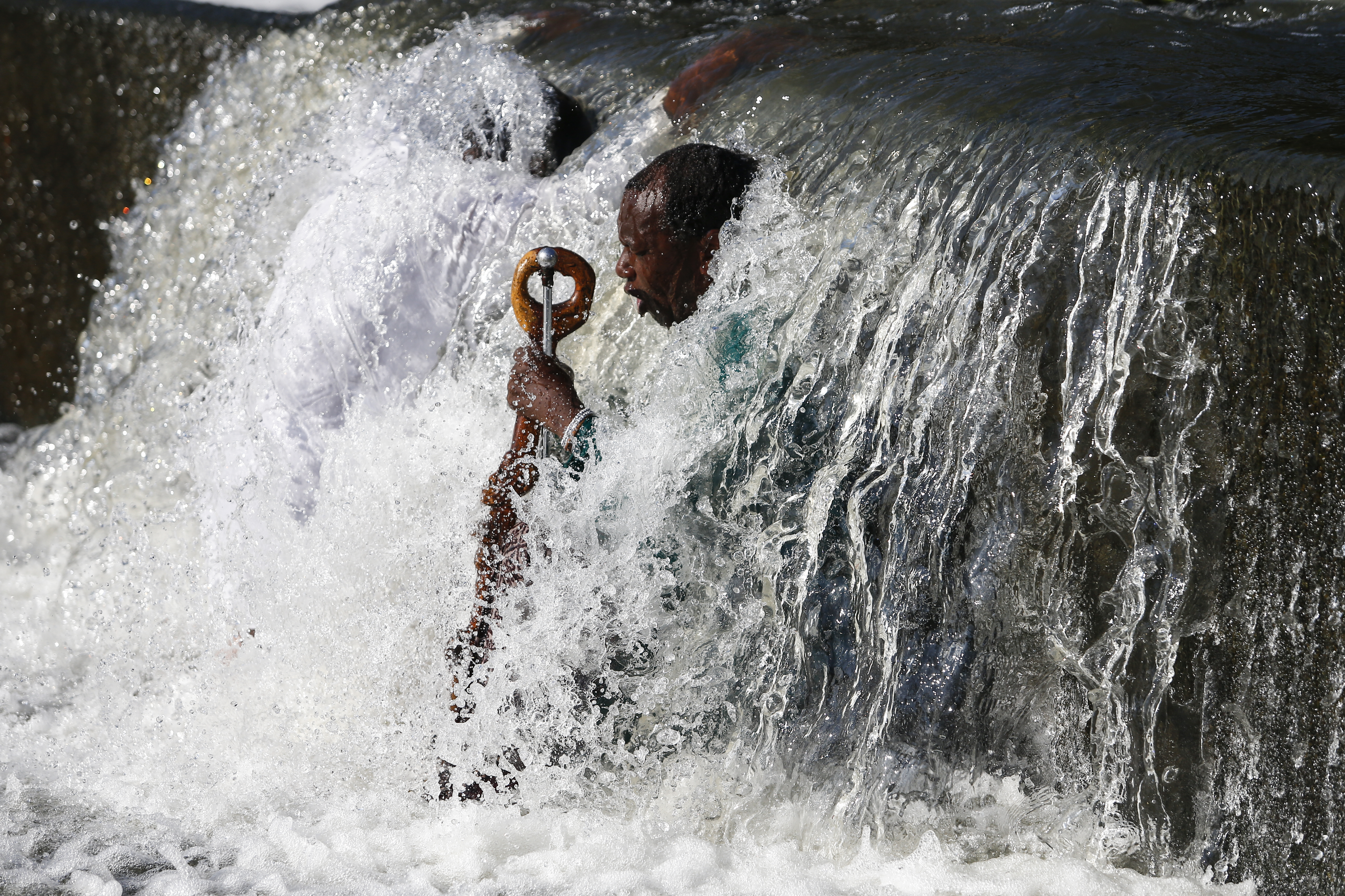 Down in the River to Pray: Good Friday Baptism ceremony at the Klipriver bridge