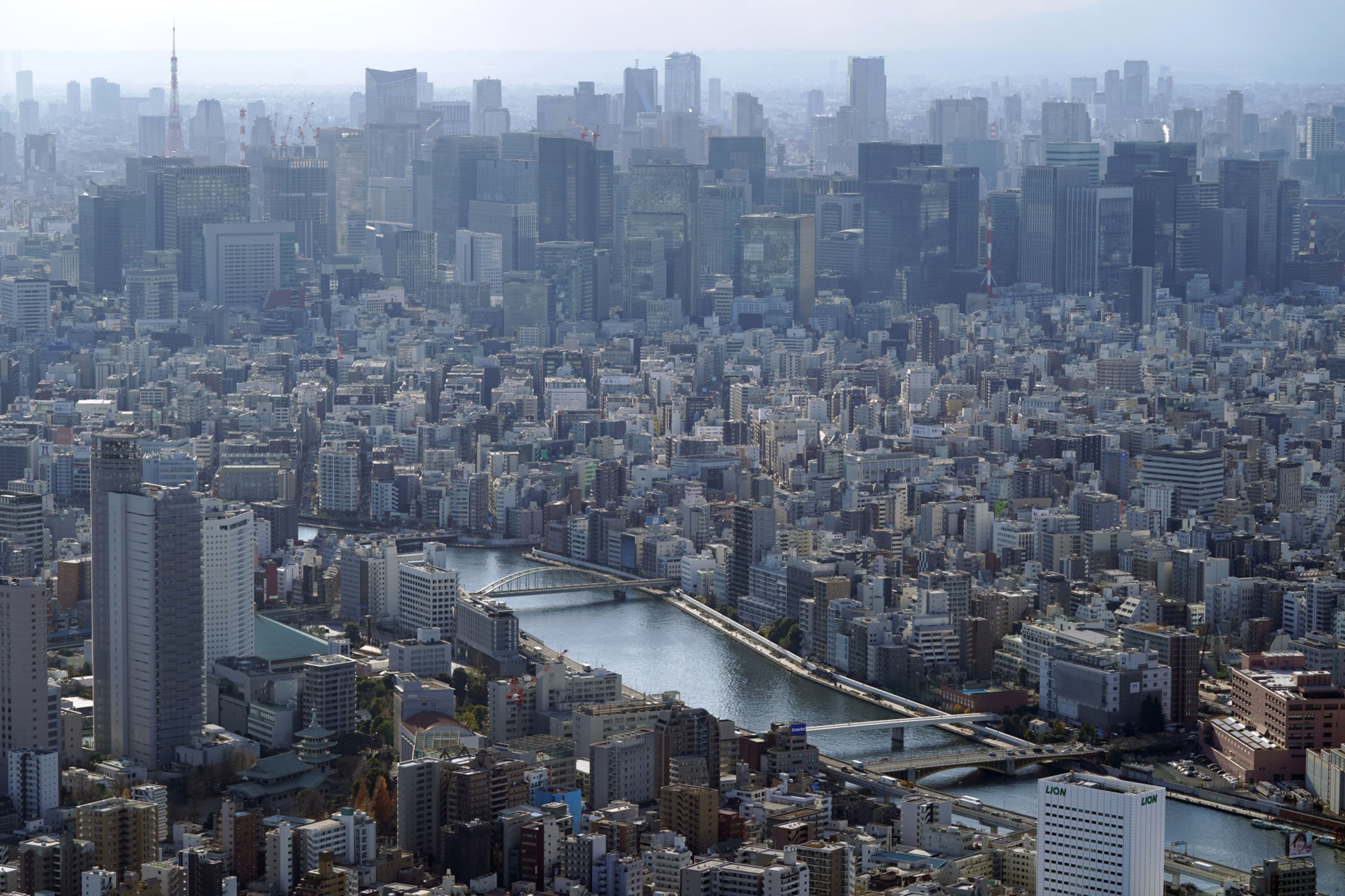 Japan set to remove most COVID restrictions as new infections ebb