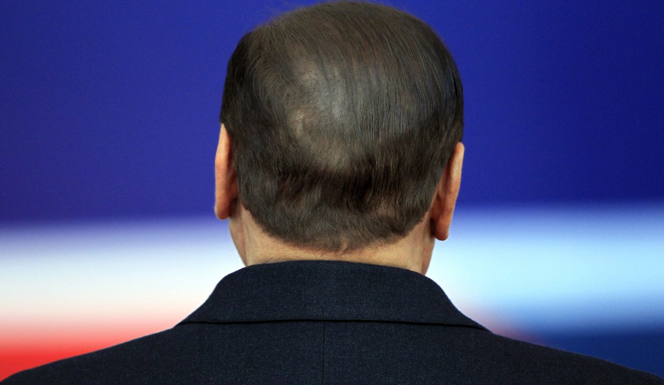 Berlusconi U-turn secures Italian government survival