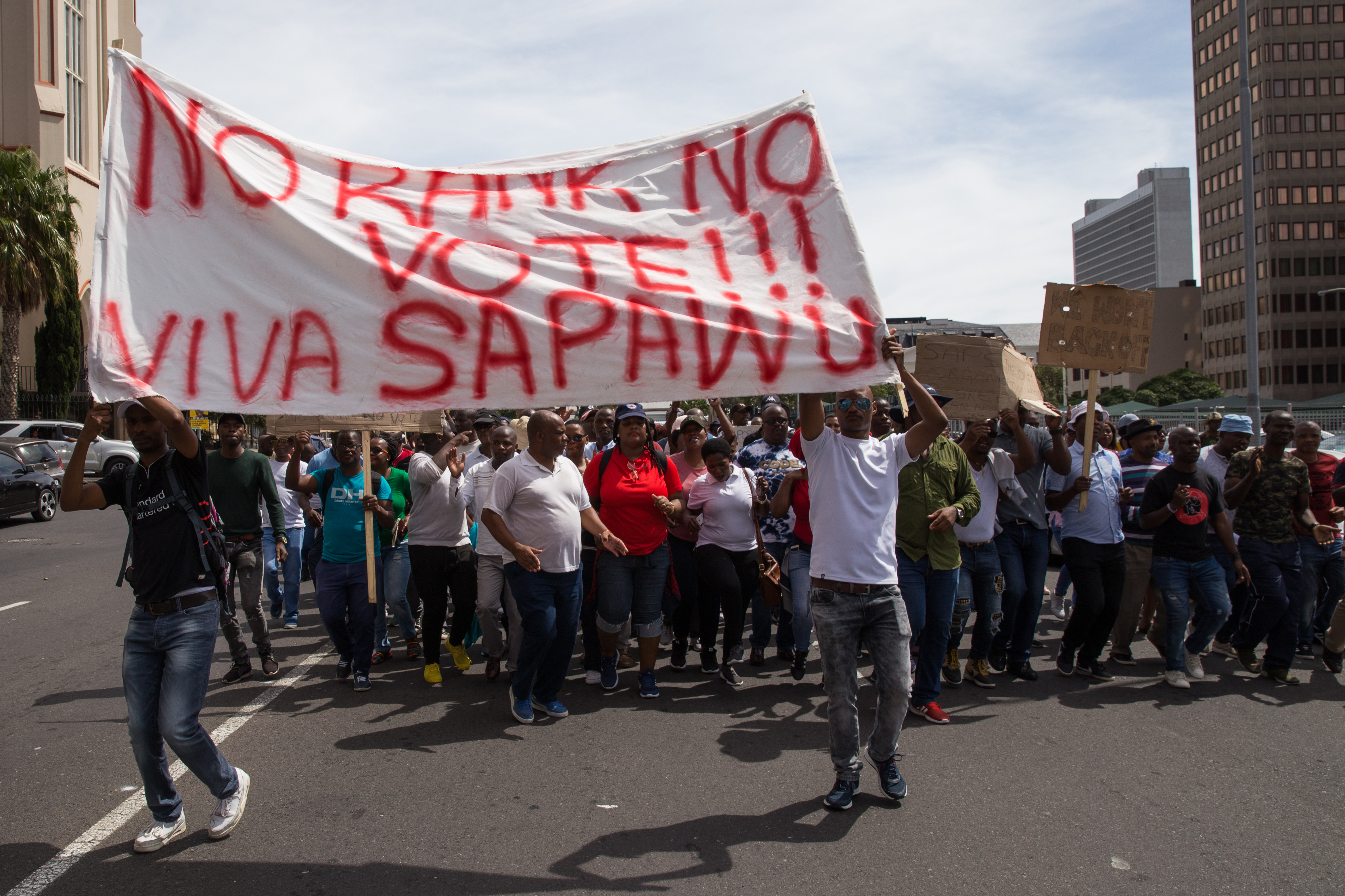Police officers march to Parliament over promotions