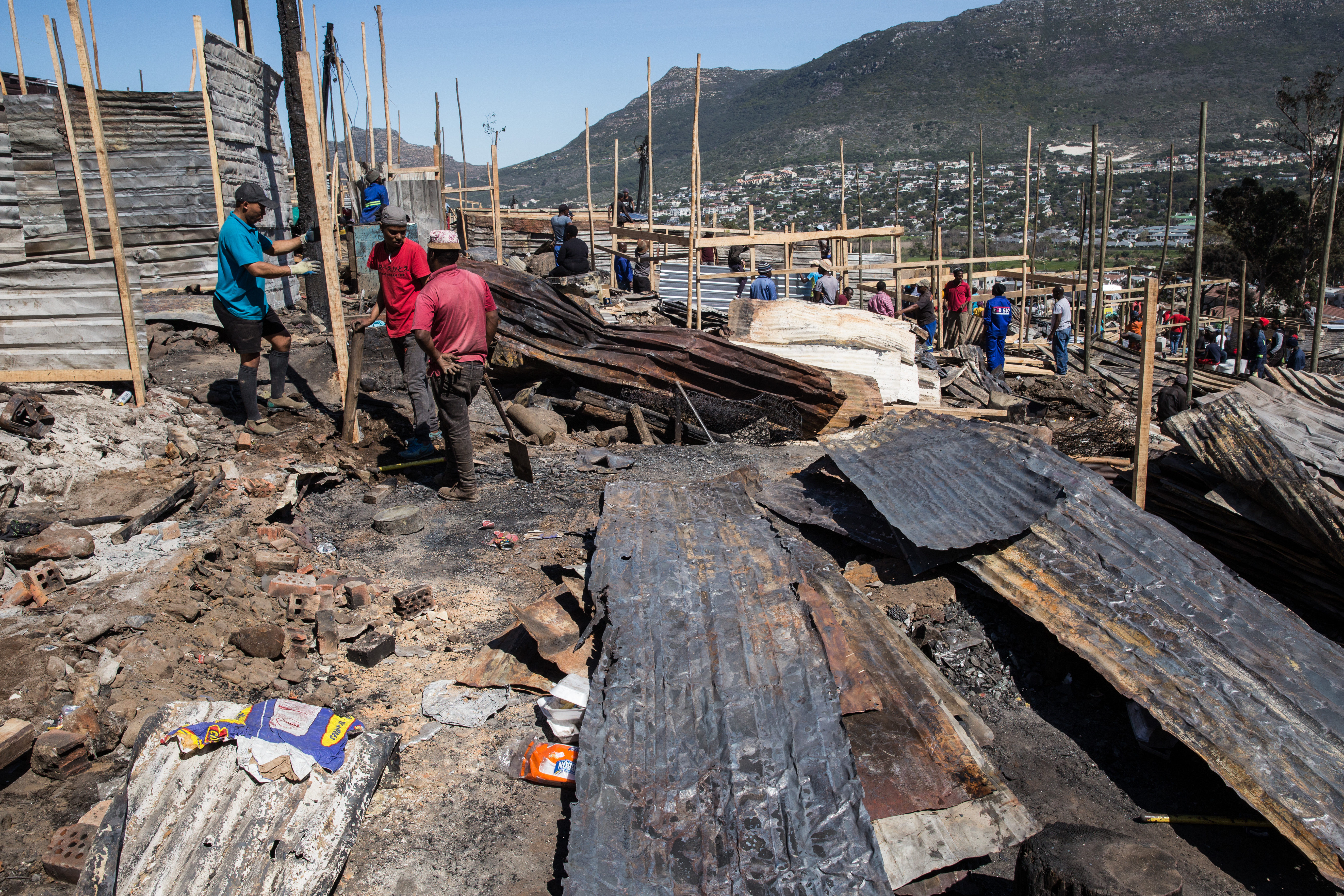 The smell of fire hangs in the air in Imizamo Yethu
