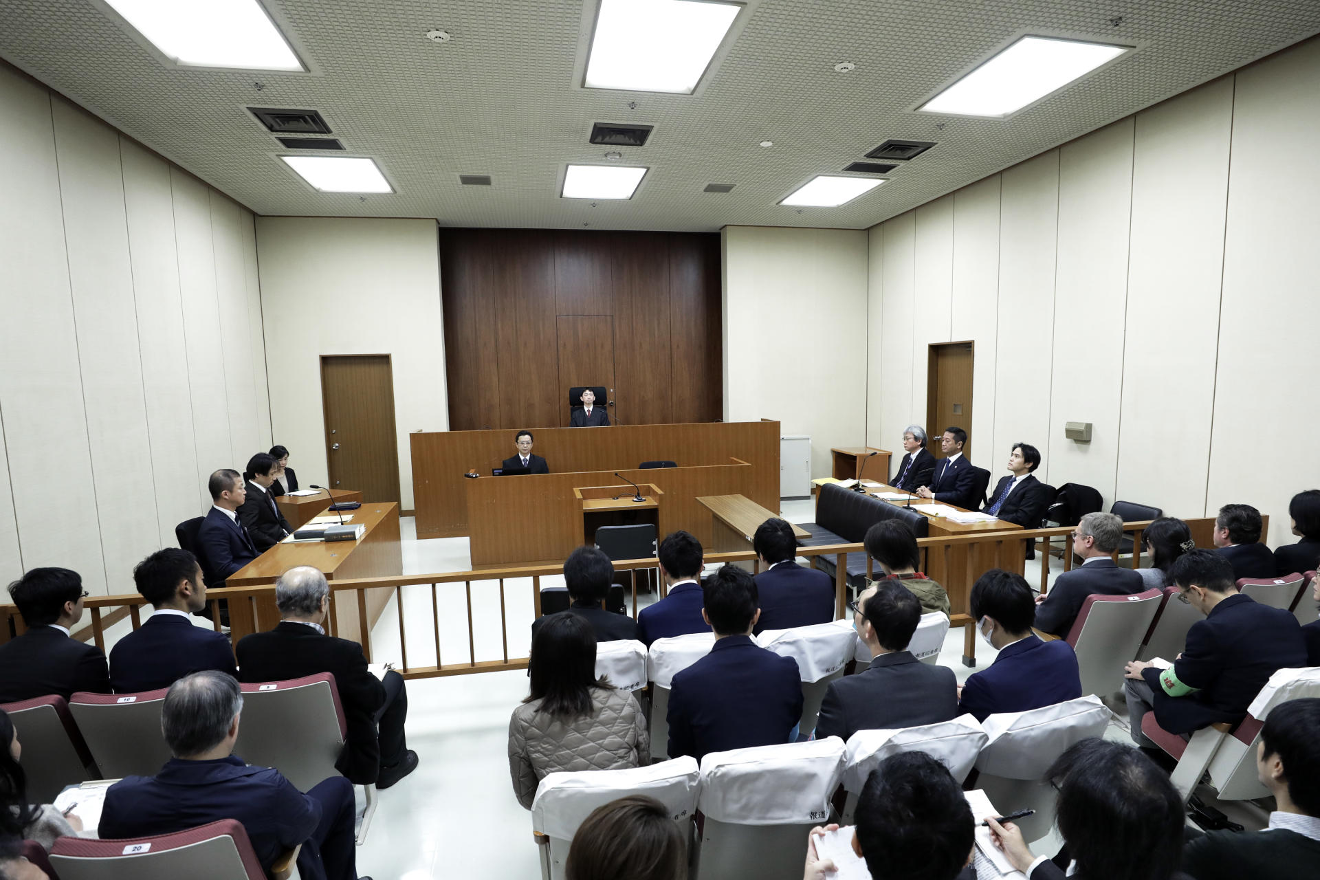 Ghosn protests innocence at high-profile court hearing