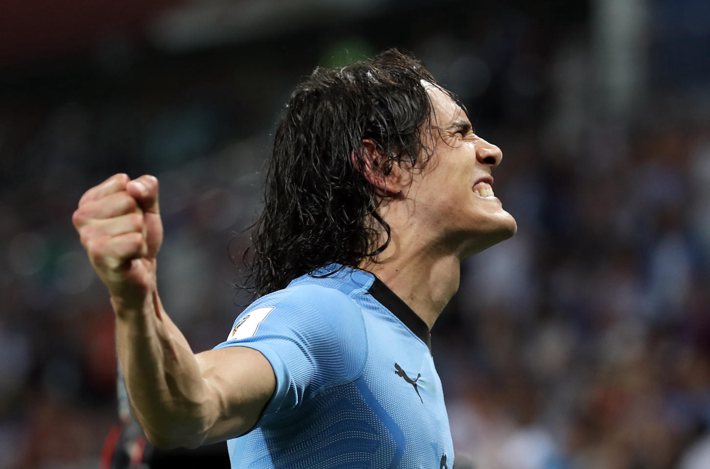 In Pictures: Edinson's light bulb moment sends Portugal packing