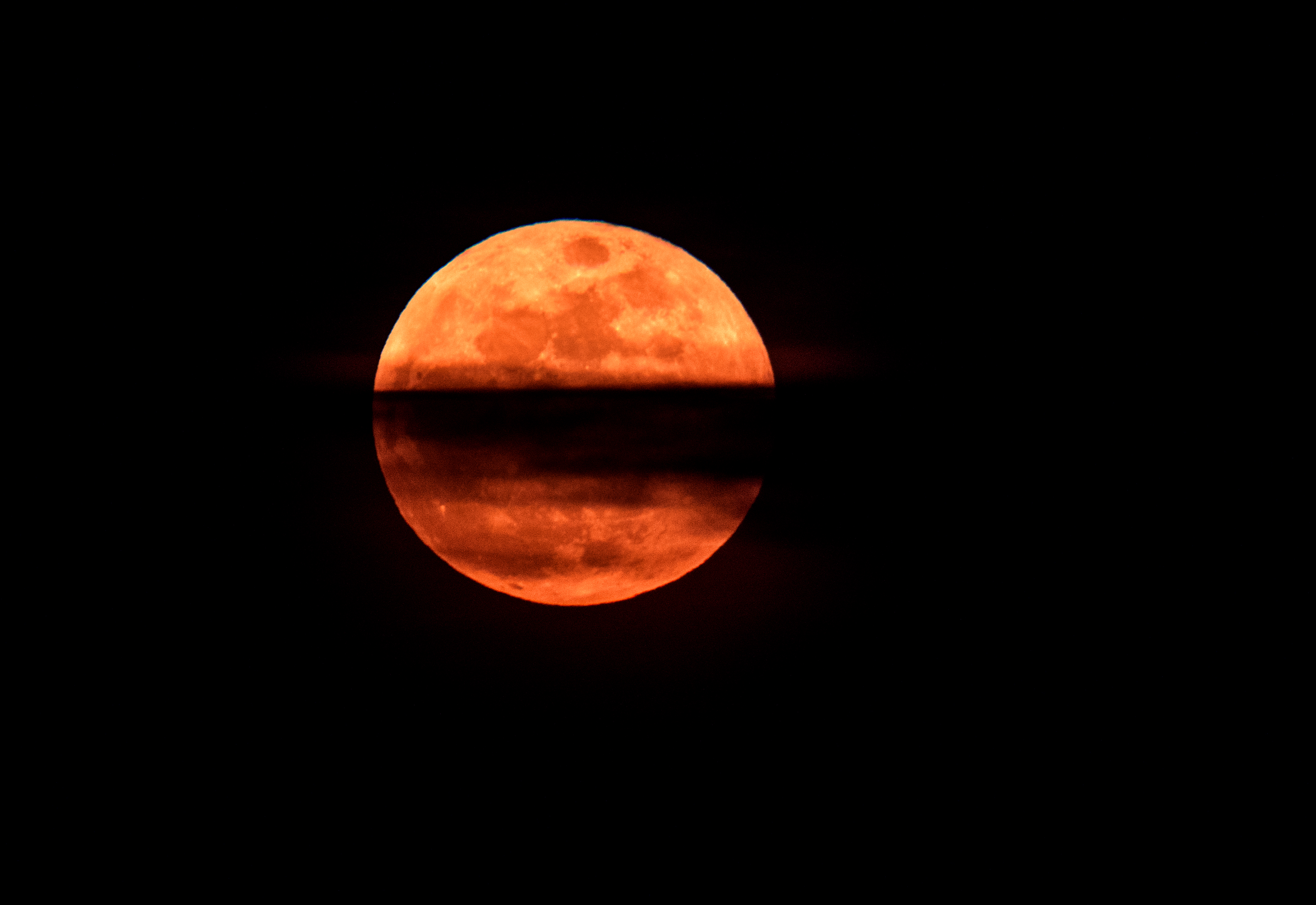 Red planet and 'blood moon' pair up to dazzle skygazers