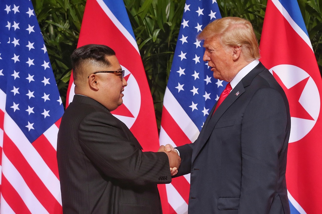 Trump, Kim share historic handshake