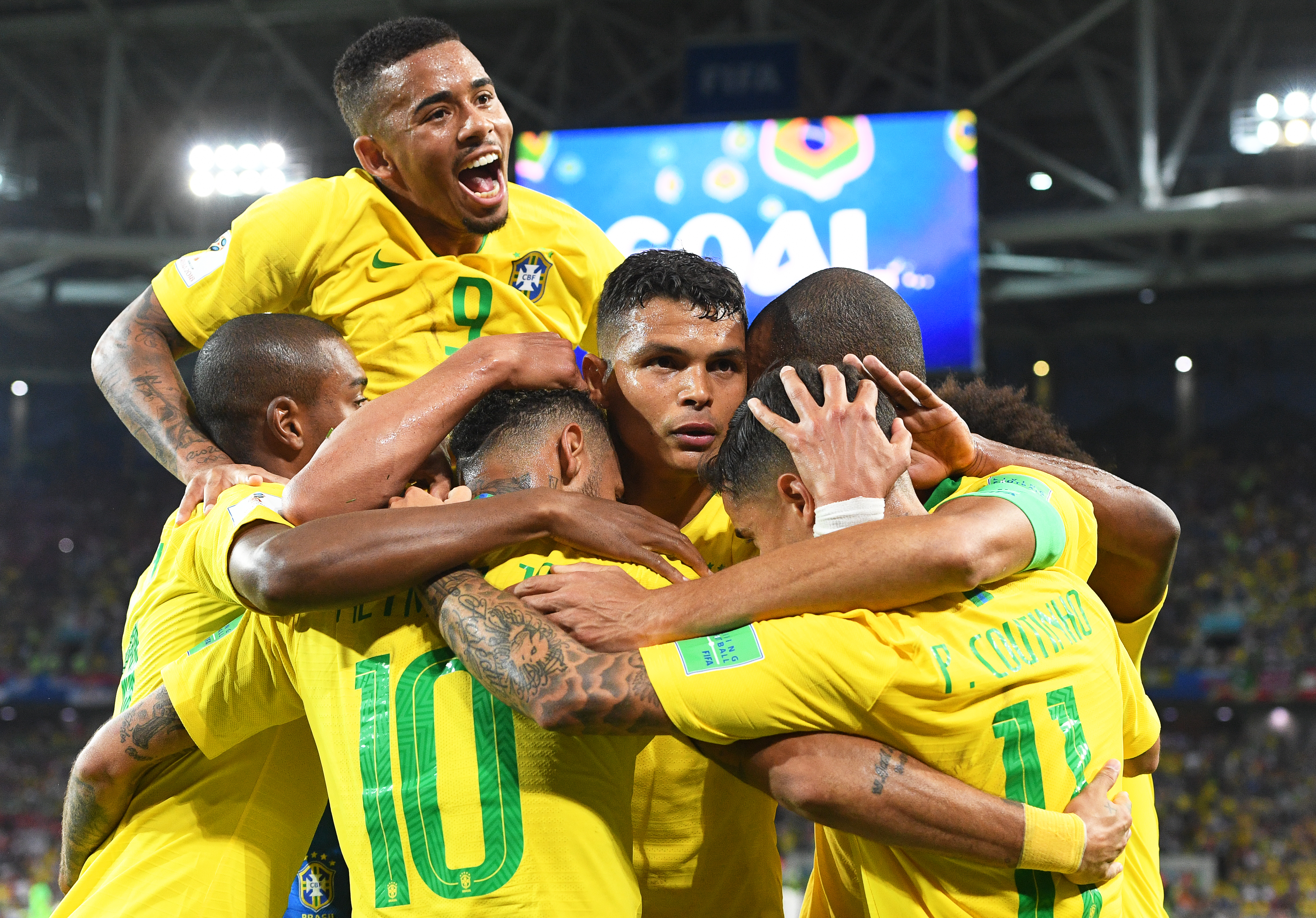 In Pictures: Thiago, Paulinho steer Brazil into World Cup's last 16