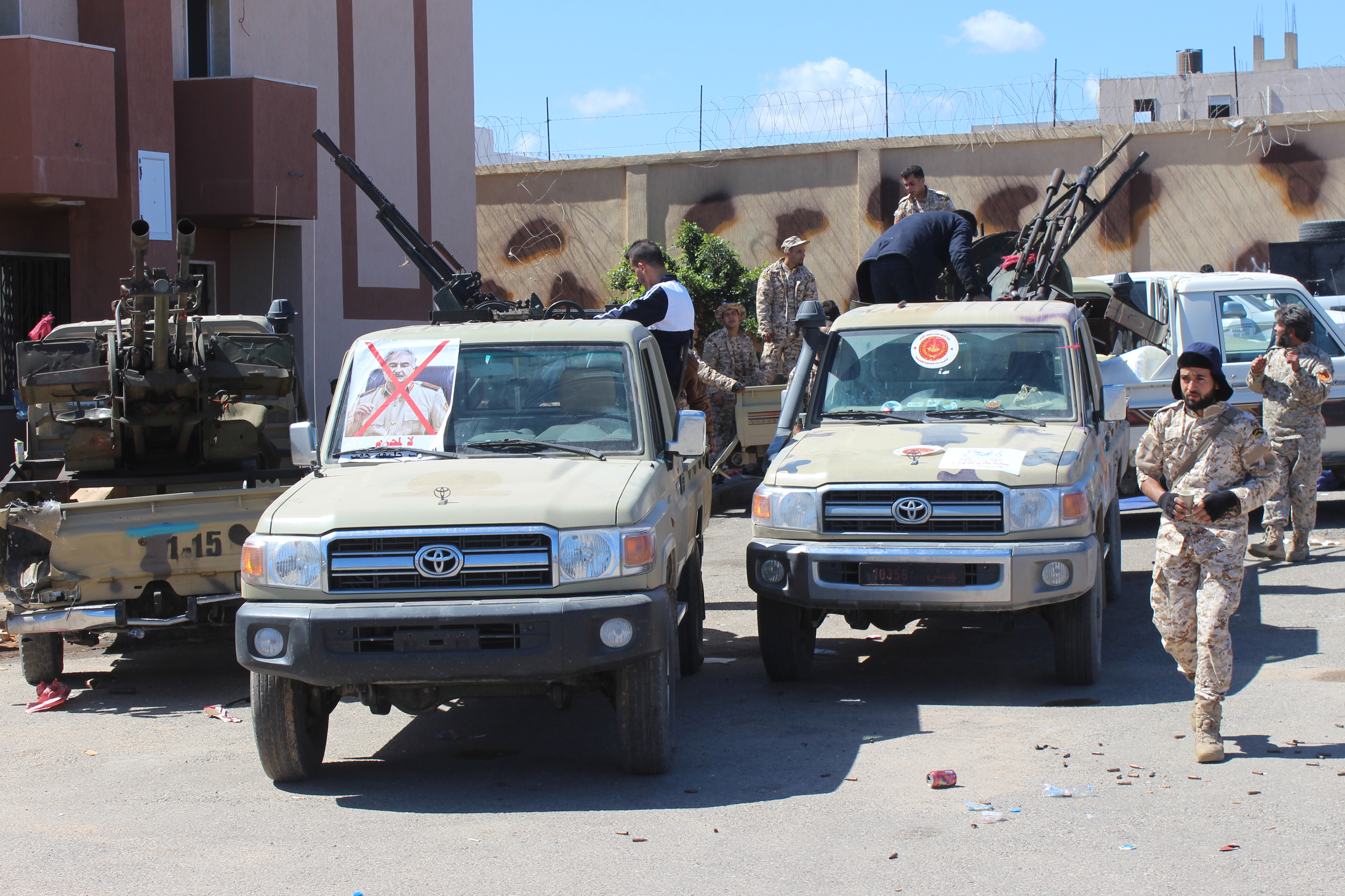 Tripoli government suspends Libya talks after Haftar attacks Tripoli port