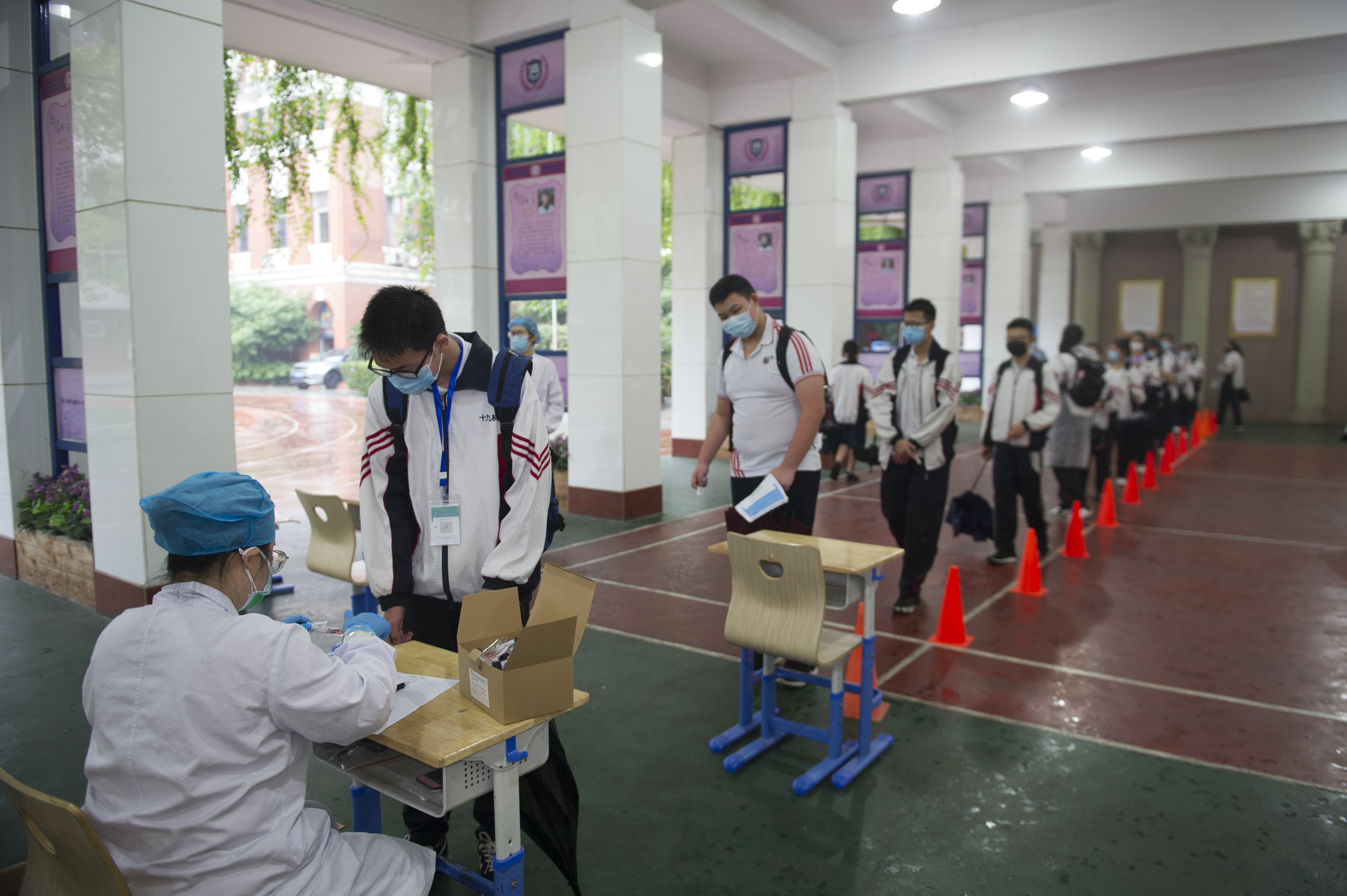 No new COVID sufferers, 300 asymptomatic, after Wuhan-wide tests