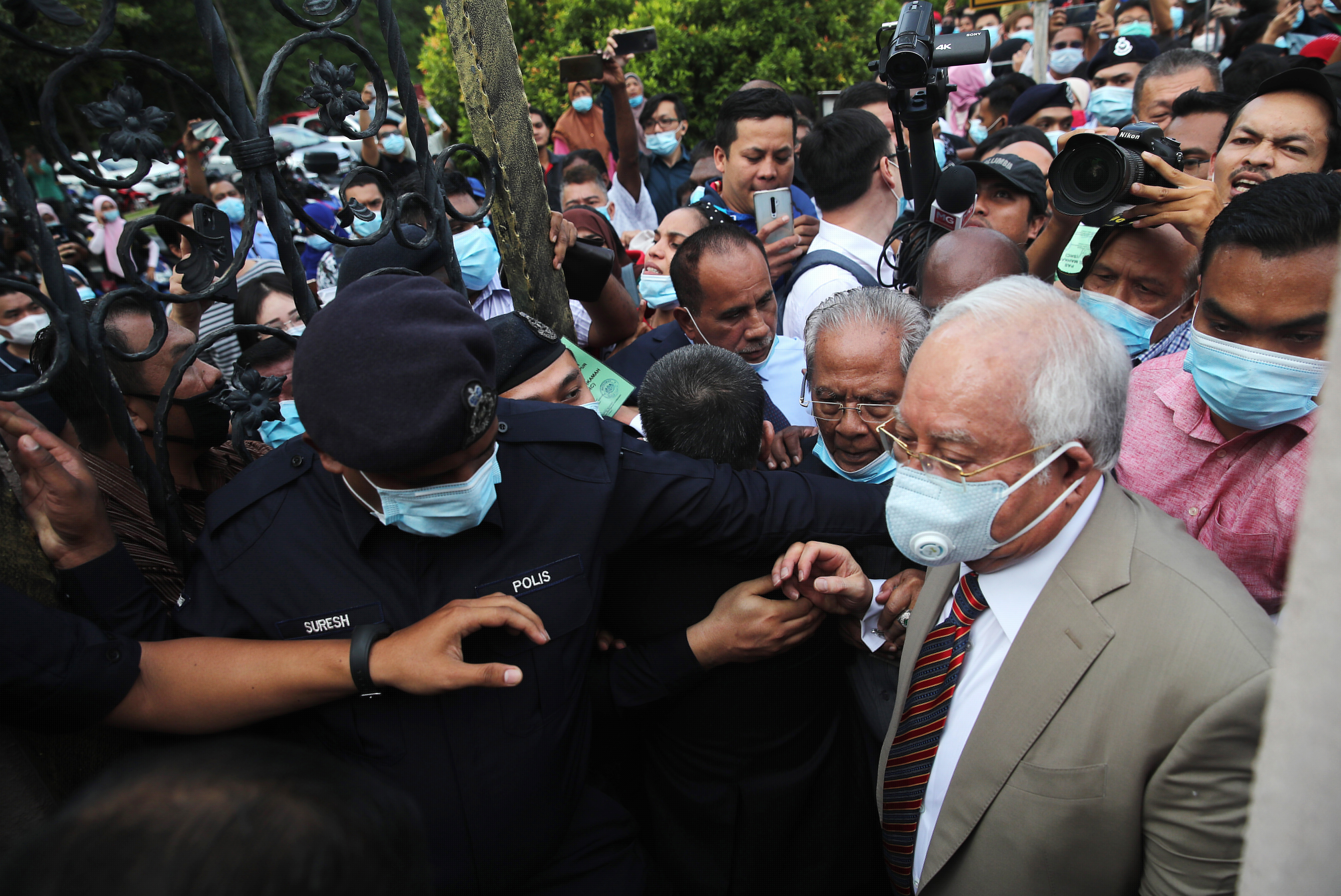 Malaysia's Najib sentenced to over a decade in jail in first 1MDB graft trial