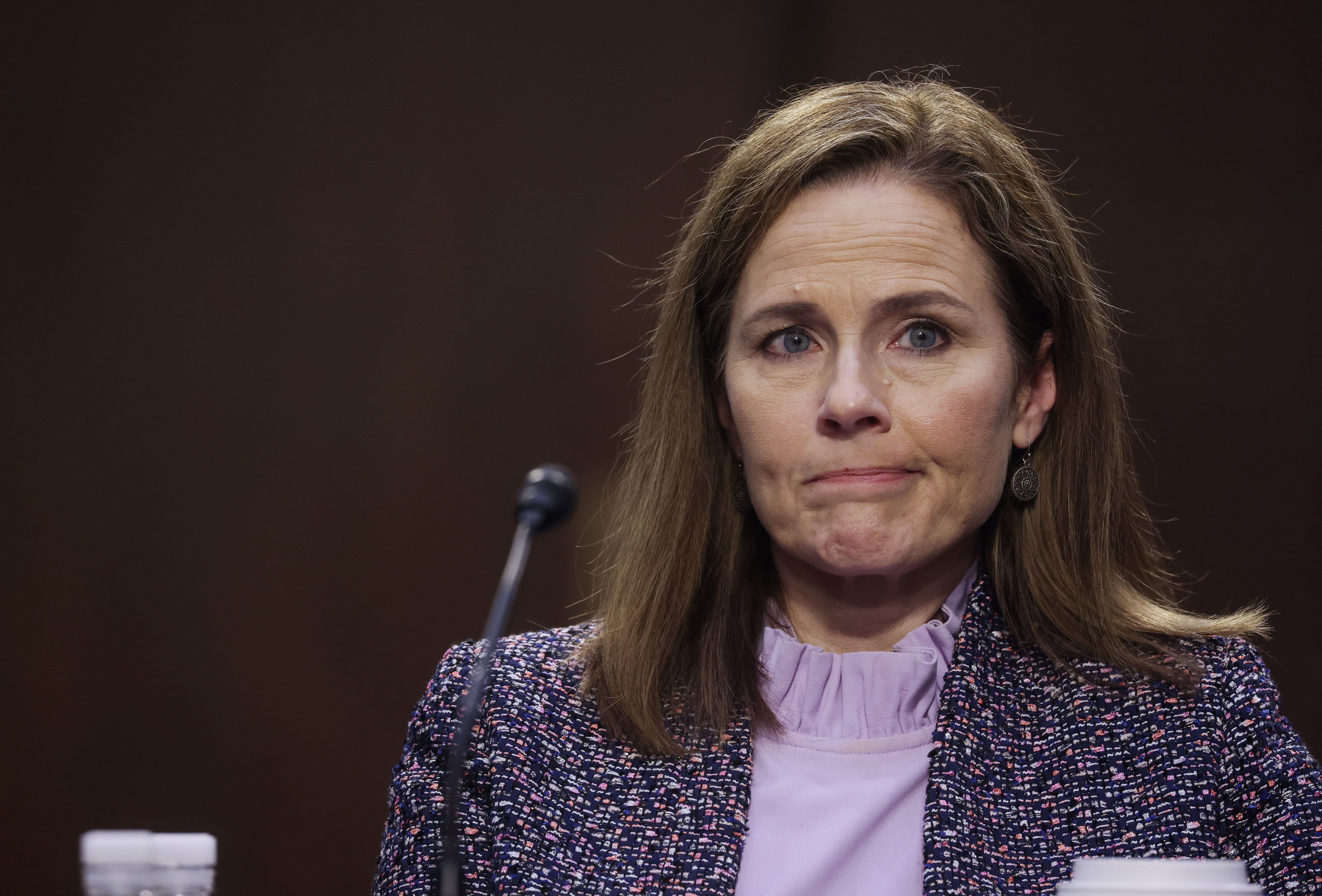 Trump's court pick Barrett calls presidential self-pardon an 'open question'