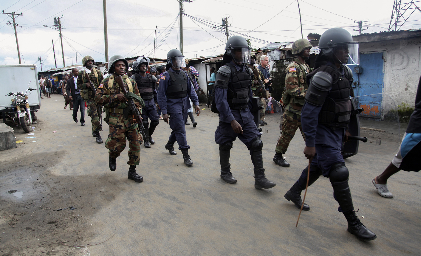 Liberian slums barricaded as ebola sets new record
