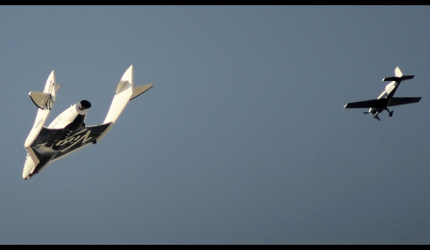 Virgin's passenger spaceship completes first rocket test flight