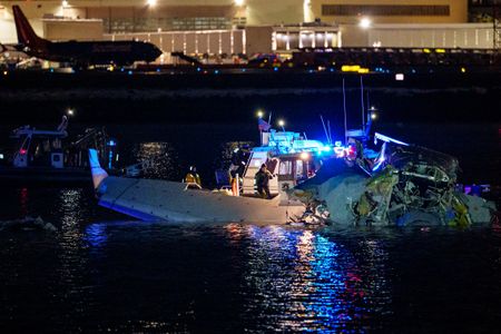 In pictures – American Airlines and army helicopter crash near Reagan Airport