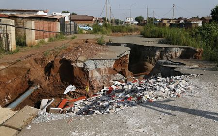A community at risk of being swallowed by hazardous, neglected sinkholes in Khutsong