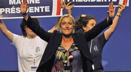 Macron and Le Pen head for French election runoff - projections