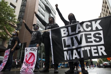 Counter-protest drowns out small Washington neo-Nazi rally