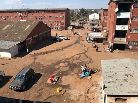 Harare’s poorest residents vote in fear