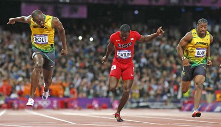 Brilliant Bolt scorches to 100m gold