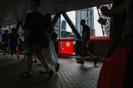 Hong Kong police put HK$1m bounty on eight wanted democracy activists
