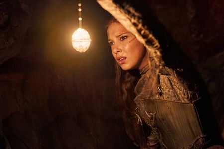 Glints of treasure in the darkness and a little scorched distress in Netflix’s ‘Damsel’ 