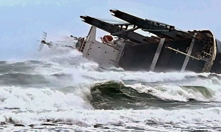 Capsized vessel — Efforts stepped up in stormy weather to prevent oil spill and to salvage cargo of fertiliser
