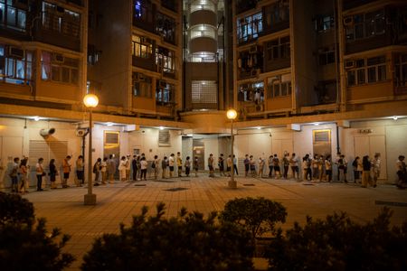 Hong Kong police arrest pro-democracy politician set to run for legislature