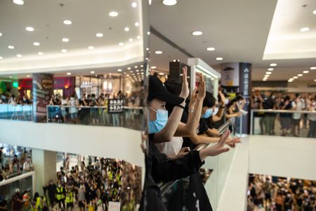 Hong Kong police arrest more than 200 as pro-democracy protests return