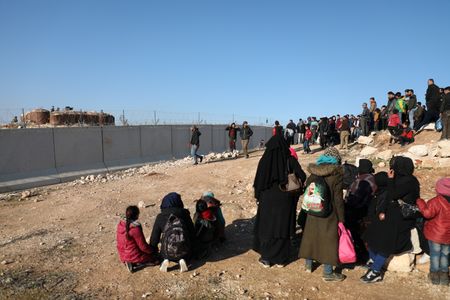 Erdogan says Turkey hits back after Syrian shells kill Turkish troops