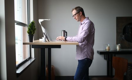 Is standing at your desk better for your health than sitting? Here’s what the evidence says