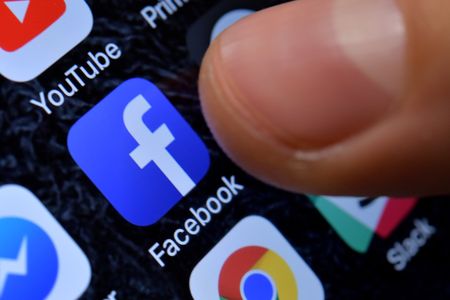 Facebook in freefall as weak outlook stuns market