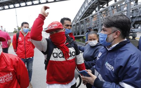 Poor residents of Colombia's capital protest lack of aid during quarantine