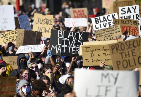 Protesters defy curfews in major U.S. cities to march against police brutality