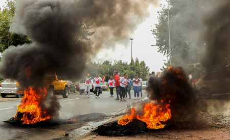 In photos – the chaos sweeping South Africa, and the patients bearing the brunt