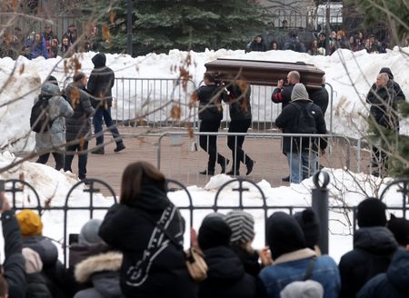 Thousands of Russians mourn Navalny at funeral, defying Kremlin