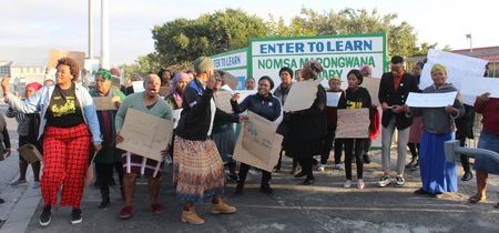 Parents protest after school suffers rash of robberies