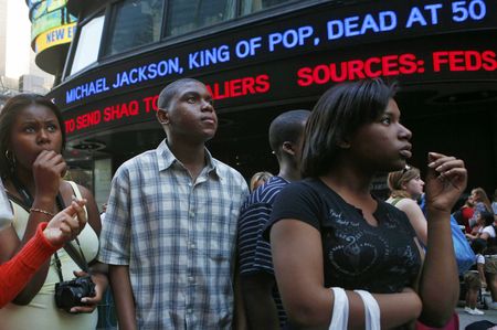 The money-spinning spectacle of Michael Jackson's life after death