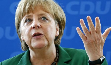 Merkel rebuffs pleas for debt action on summit eve