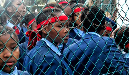 School children in Zimbabwe and Malawi protest to defend rights to education