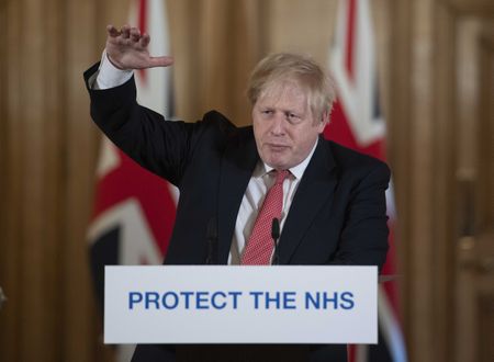 UK PM Johnson's adviser Cummings isolating with coronavirus symptoms