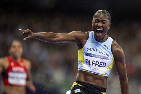 Julien Alfred’s historic sprint gold overshadowed by Fraser-Pryce debacle in Paris