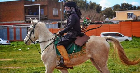 Horsemen with bows and arrows confront gangsters in Cape Town during ‘Pagad G-Force’ march