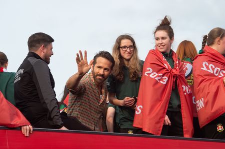 Wrexham paint town red with bus parade after promotion to EFL