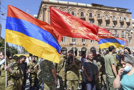 Armenian, Azeri forces battle again, at least 21 reported killed