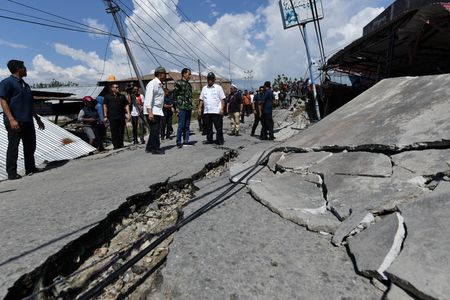Mass burials to begin as Indonesia toll tops 800