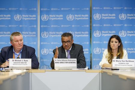 WHO chief says he will keep leading virus response after Trump threat