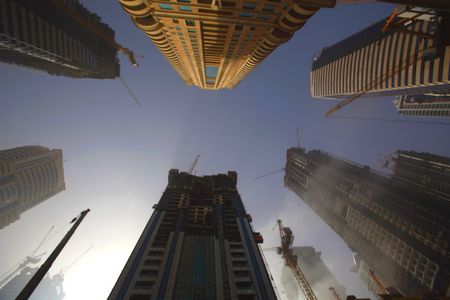 Dubai teeters on the brink, Abu Dhabi to swoop in